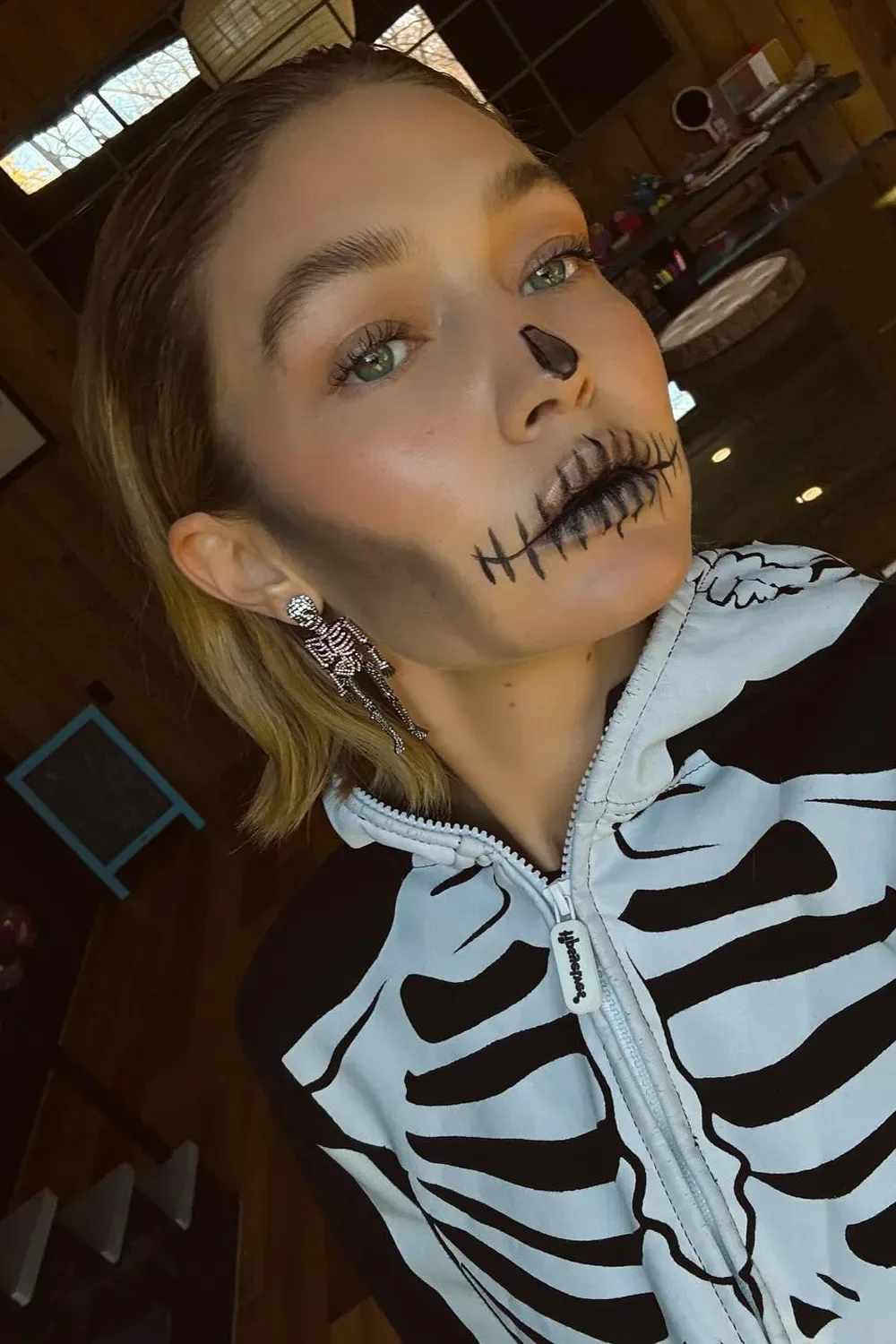 Gigi Hadid dresses up as a skeleton for Halloween in 2024.